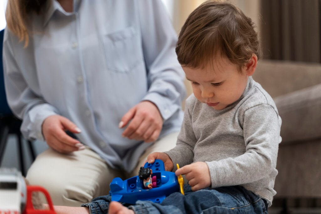 high angle cute kid playing with toy